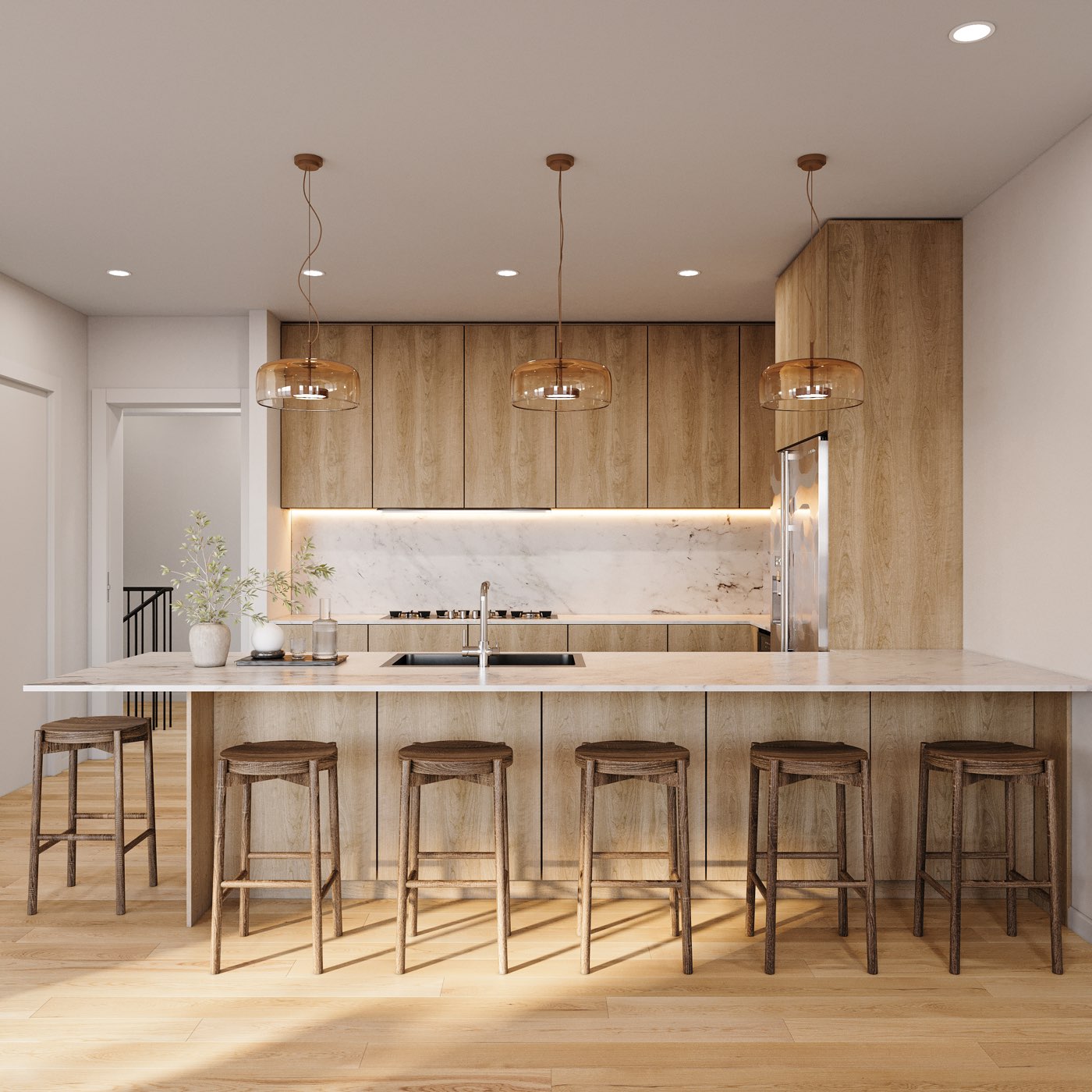 Custom home interior kitchen featuring oak finishes and barstools, by Talbot Custom Homes in Orlando, FL