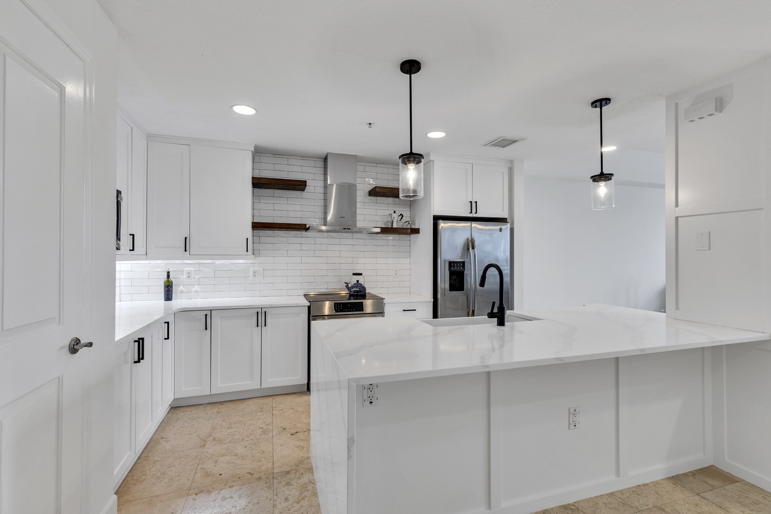 All white kitchen remodel by Talbot Custom Homes in Orlando, Florida